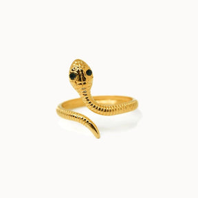 Goldener Schlangenring für Damen mit grünen Augen aus Zirkonia.
