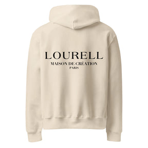 Rückansicht des sandfarbenen Unisex Oversize-Kapuzenpullovers, der den großen, schwarzen Rückenprint 'LOURELL MAISON DE CRÉATION PARIS' zeigt.